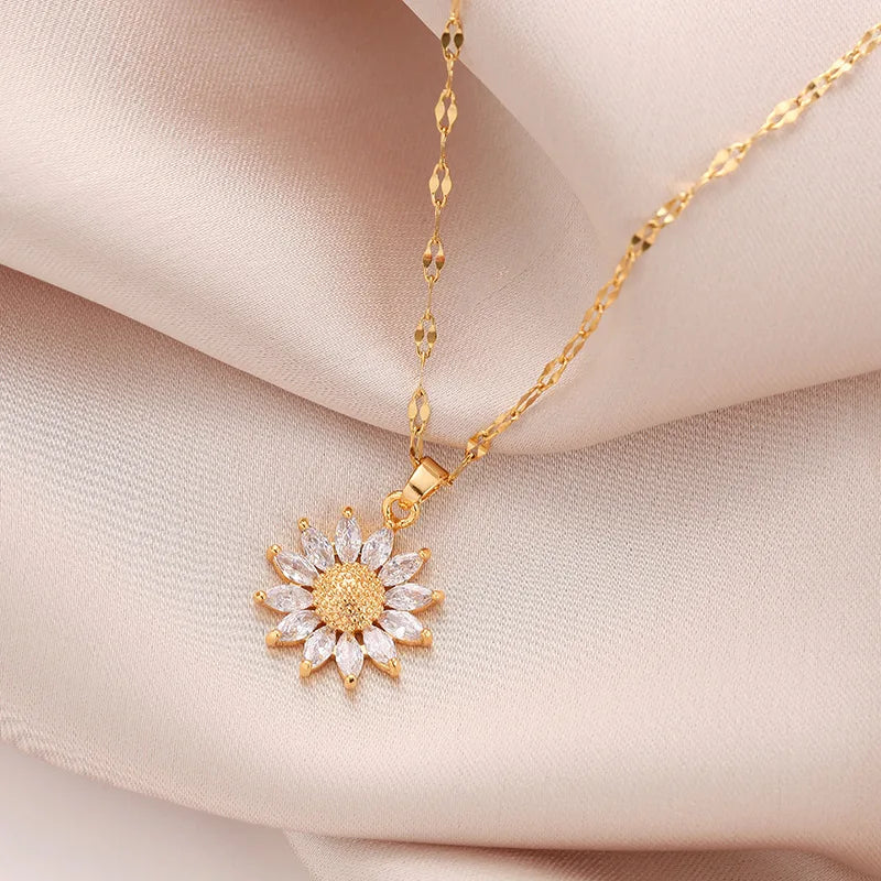 Close-up of sunflower charm showing petal detail and polished finish