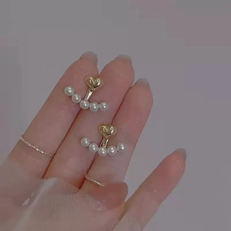 Imitation pearl earrings – close-up detail | Dainty Diana