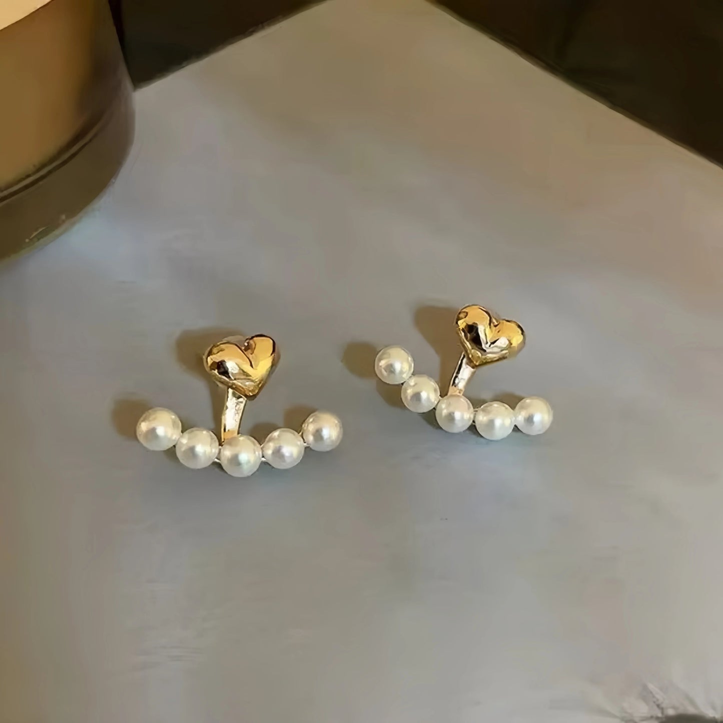 Soft gold pearl earrings – flat lay with packaging | Dainty Diana