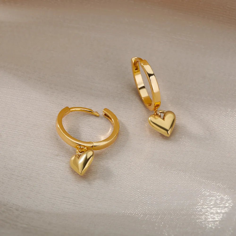 Stainless steel heart earrings – gold finish close-up | Dainty Diana