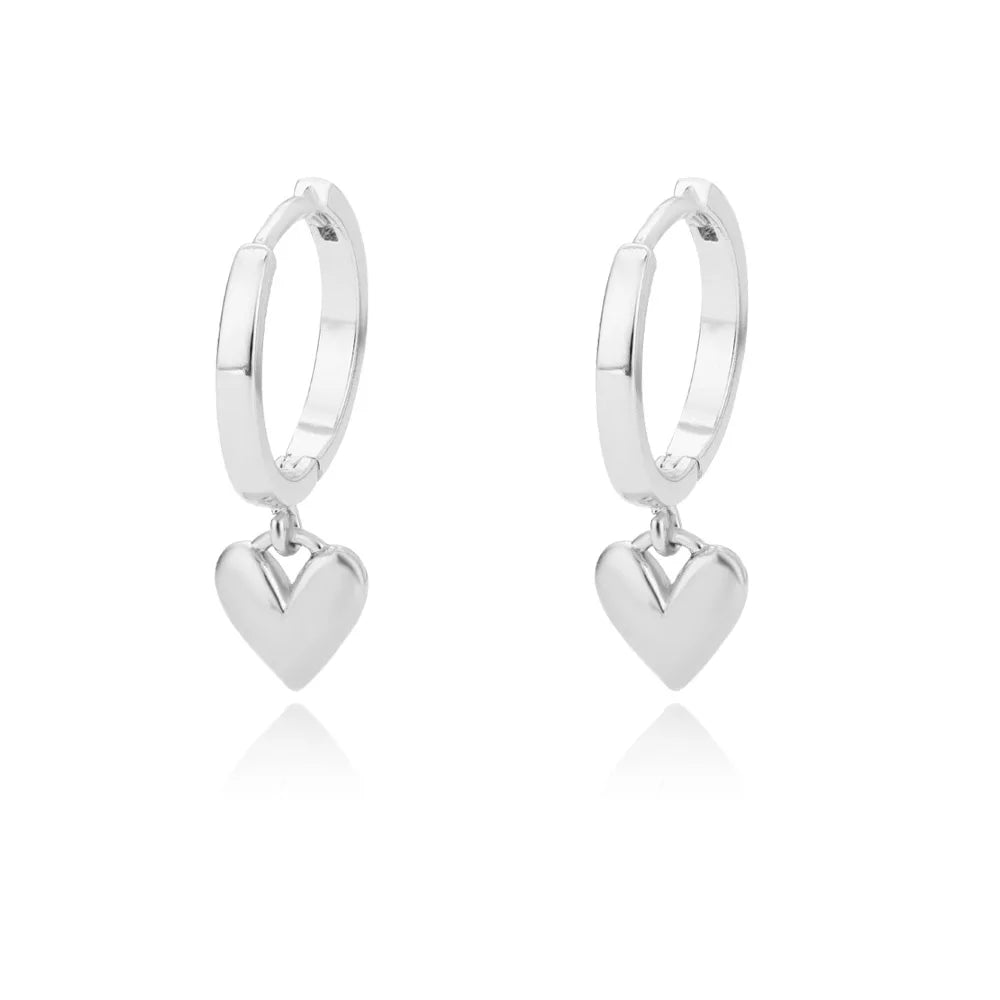 Stainless steel heart earrings – silver finish close-up | Dainty Diana