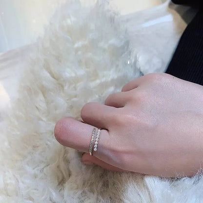 Elegant open ring with pearl – flat lay composition | Dainty Diana