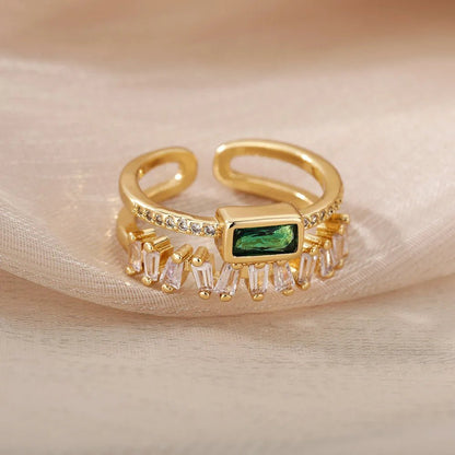 Soft Gold Adjustable Ring with Green Zircon and Layered Curves