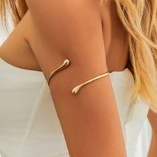 Waterdrop open cuff bracelet in soft gold – front view | Dainty Diana